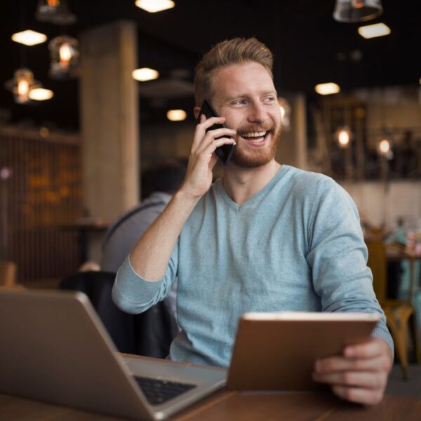 smiling man on phone call